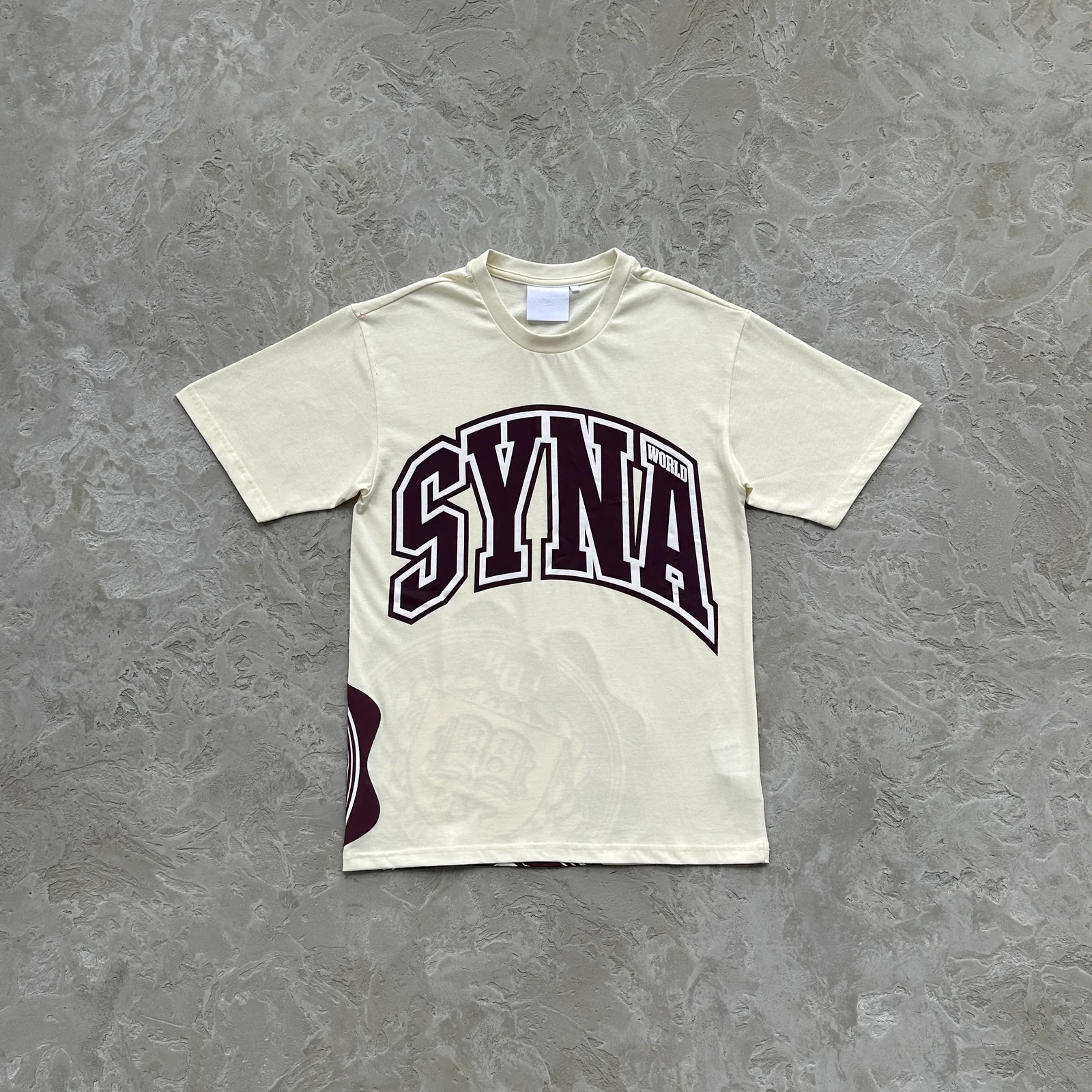 Camiseta College Syna World Creme